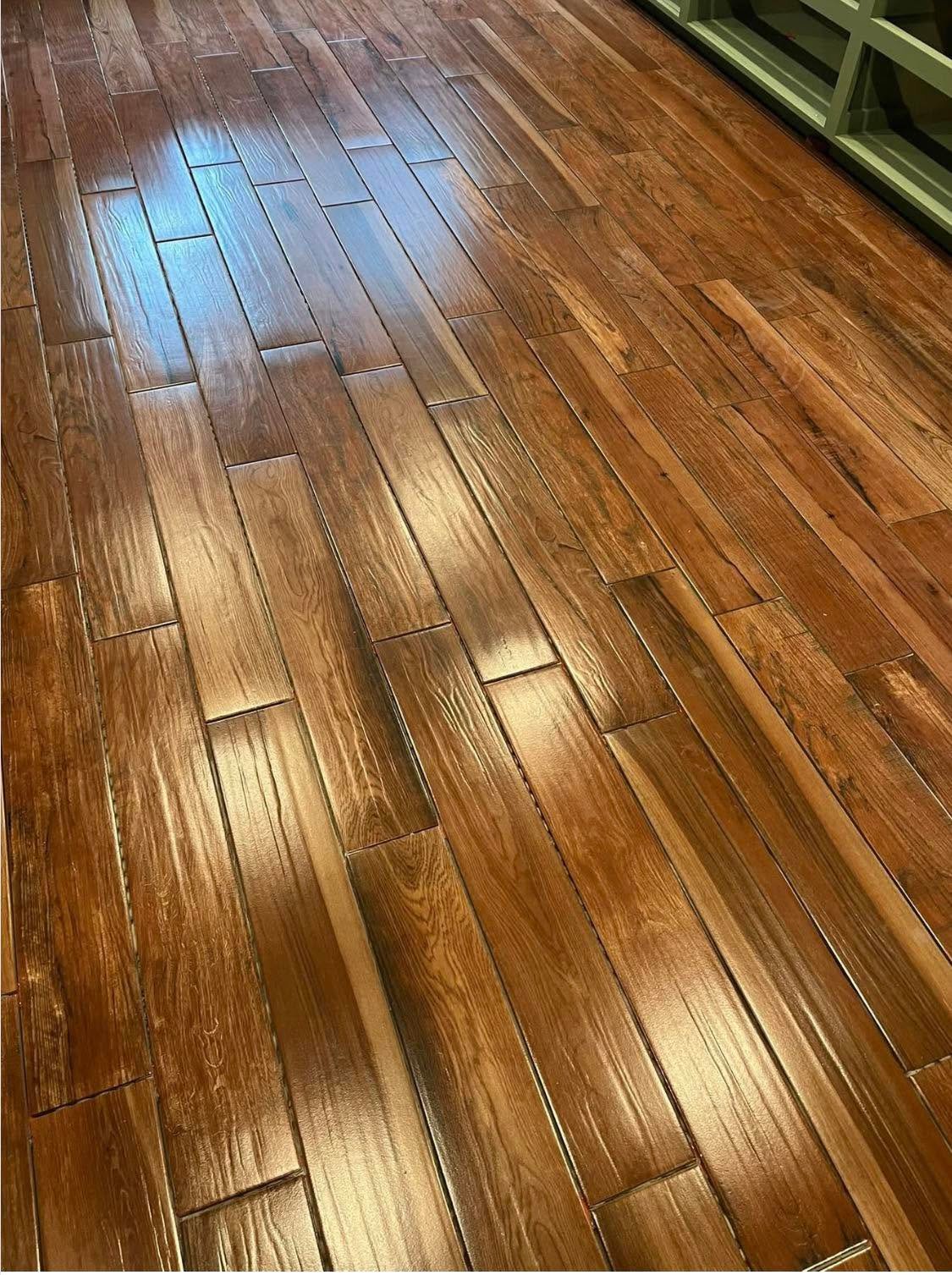 Warm wood-look ceramic flooring installed by Pops Flooring Solutions