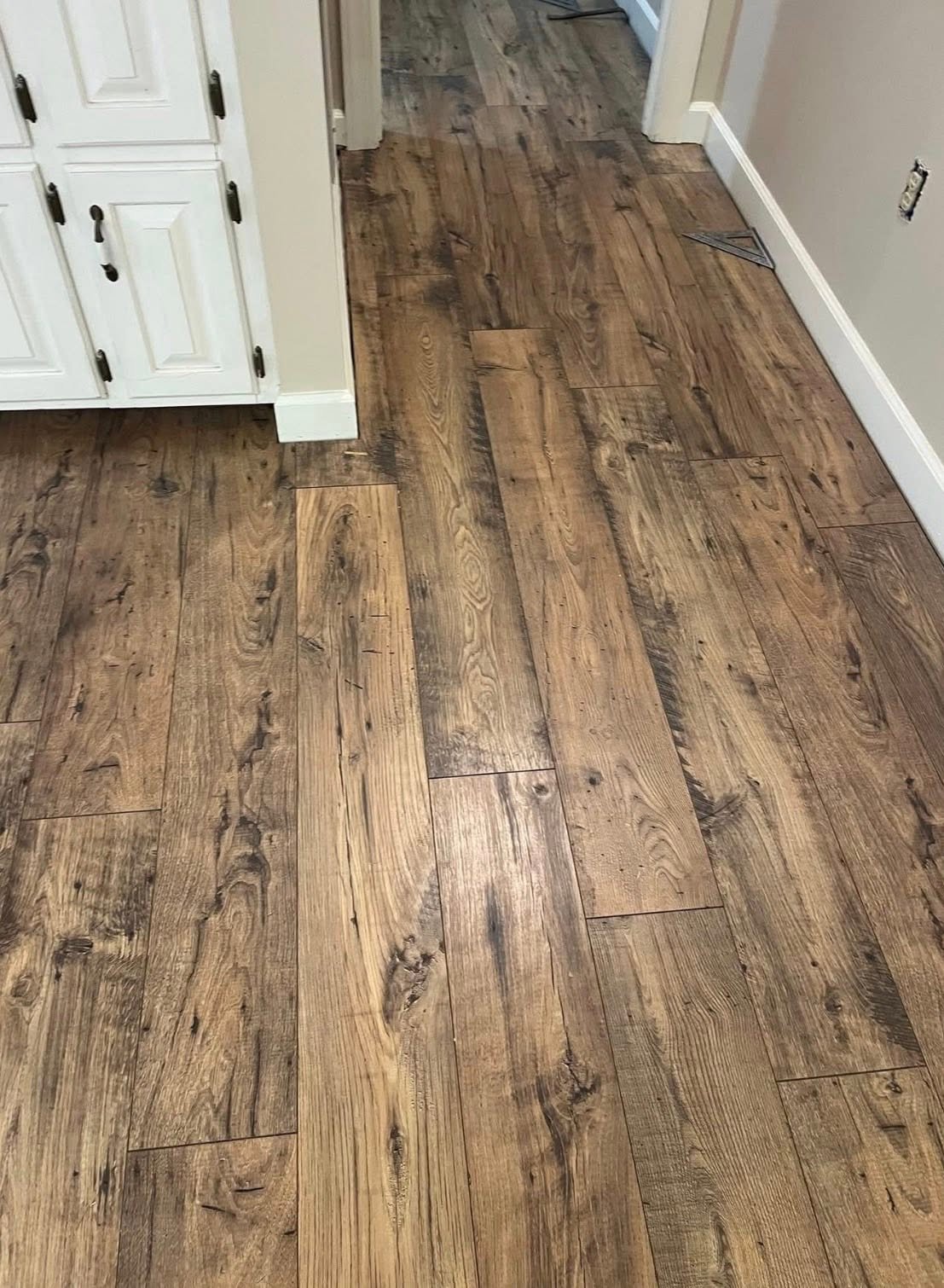 Natural wood-look laminate flooring in a finished room